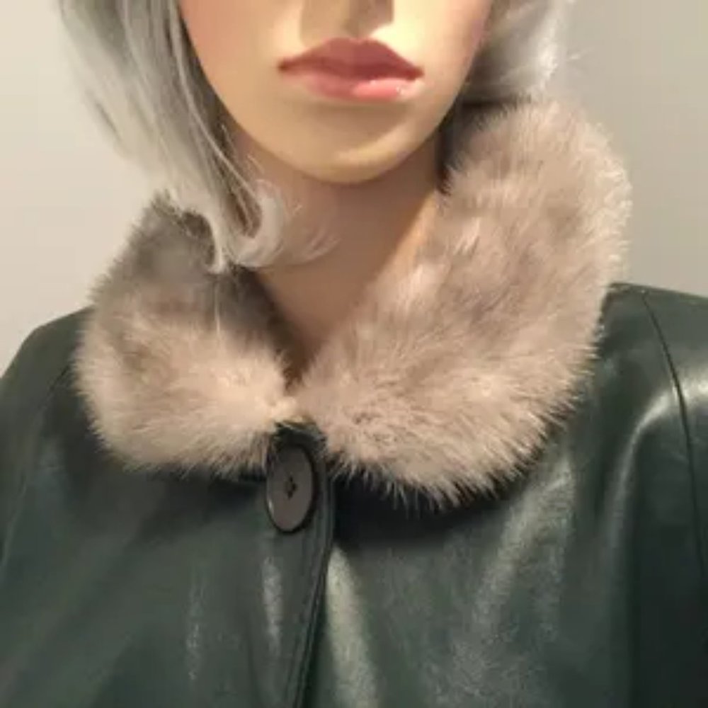 Leather  outfit : coat and skirt.